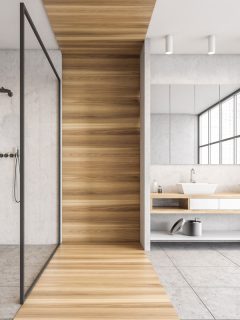 photo of a wooden-white-bathroom-two-sinks-towels, How To Build A Shower Pan On A Concrete Floor