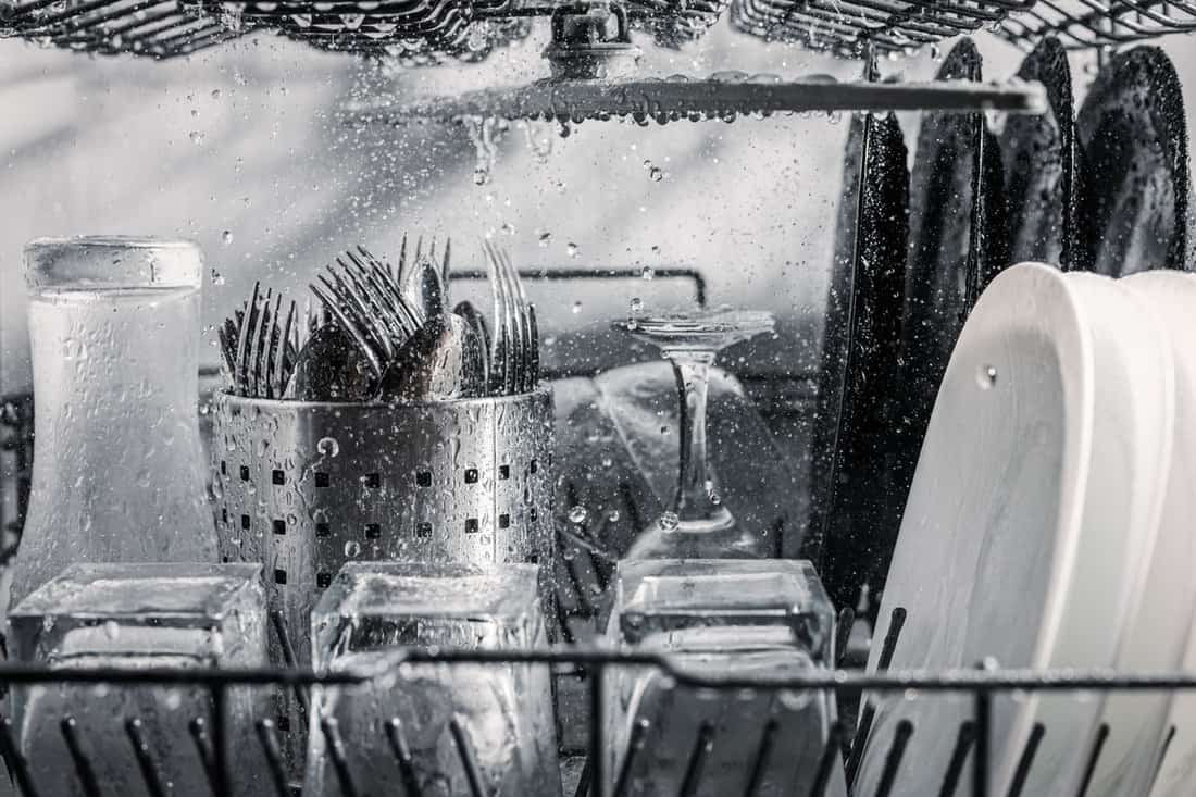 transparent-black-white-dishes-well-cutlery