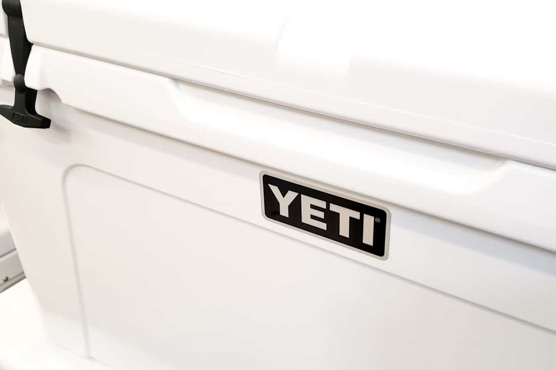 A closeup view of a Yeti cooler, seen at a camping retail store.