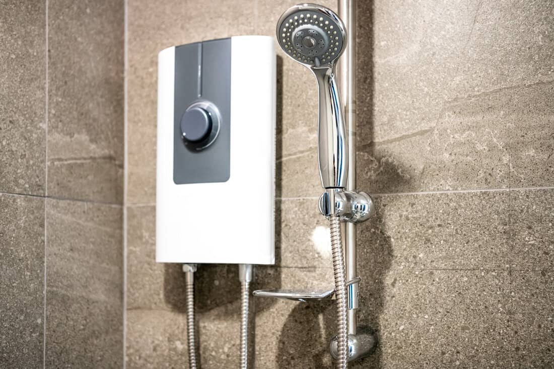 A water heater and shower in a modern bathroom