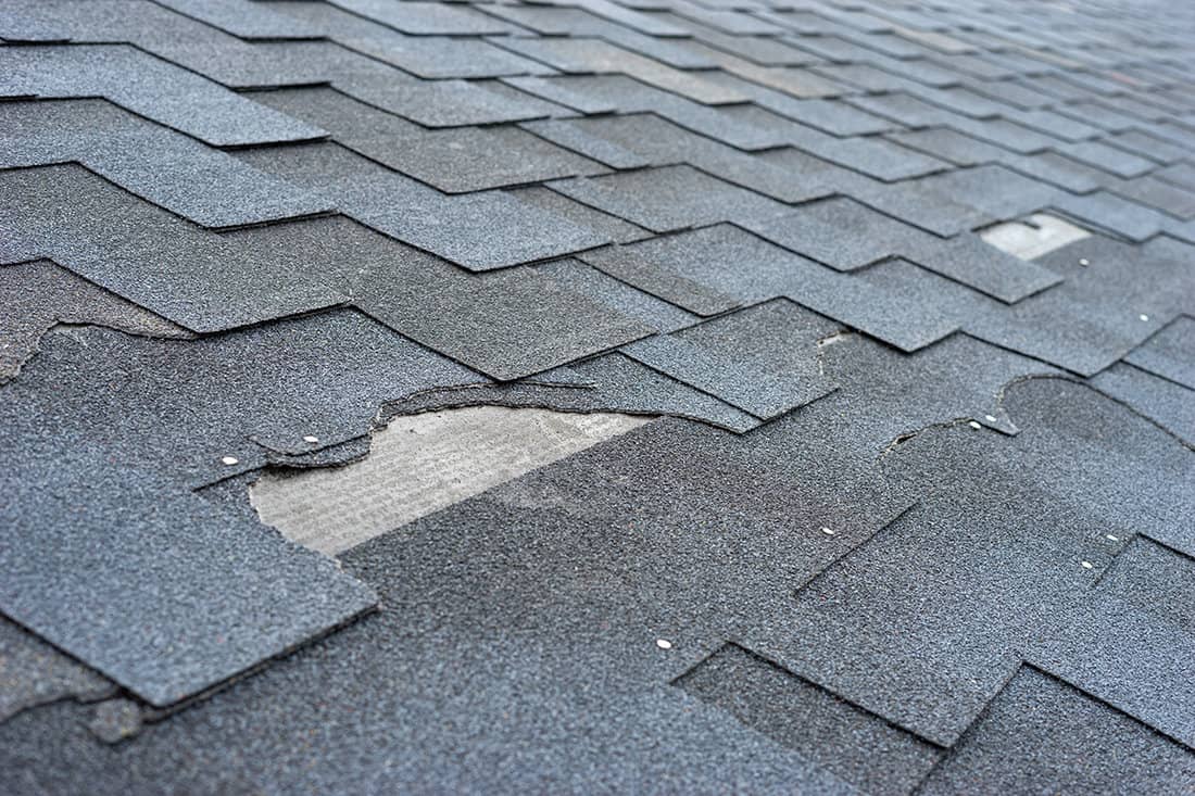 Asphalt shingles roof damage