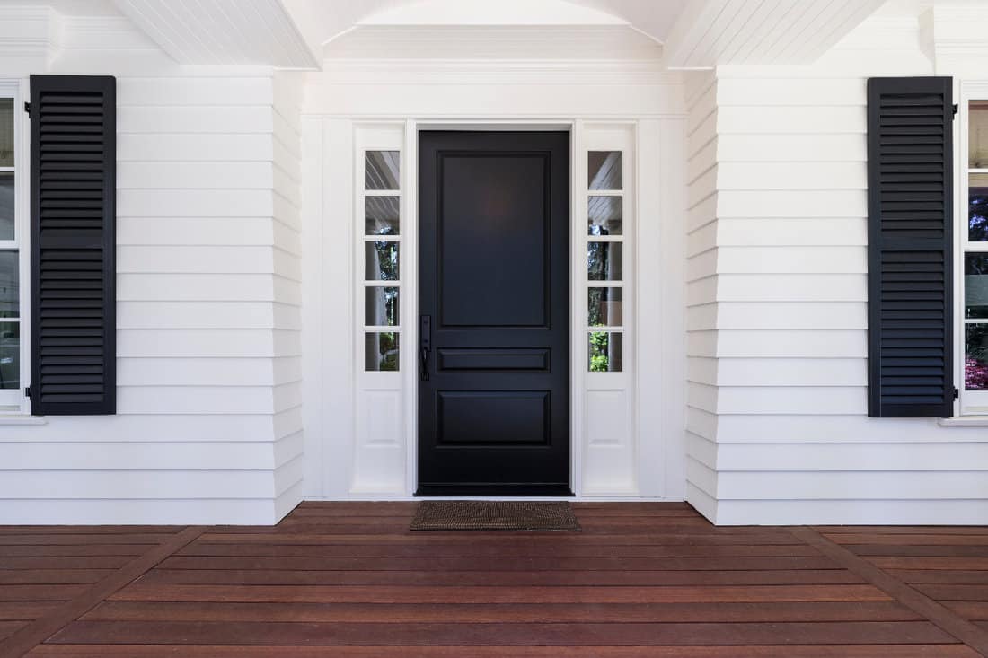 Black front door of classic style home
