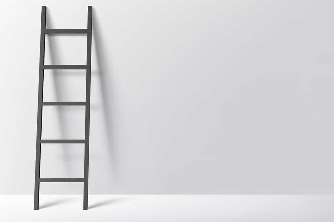 Black ladder on light grey wall background with shadow. Vector illustration