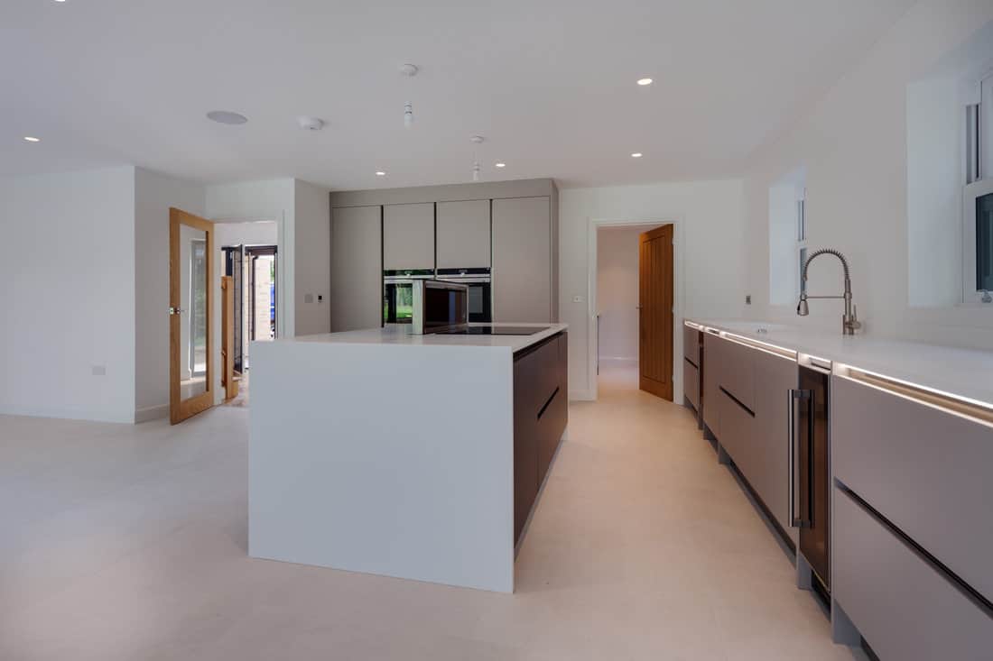 Brand new luxury kitchen with built in appliances and cupboards including wine fridge and peninsular unit housing hob
