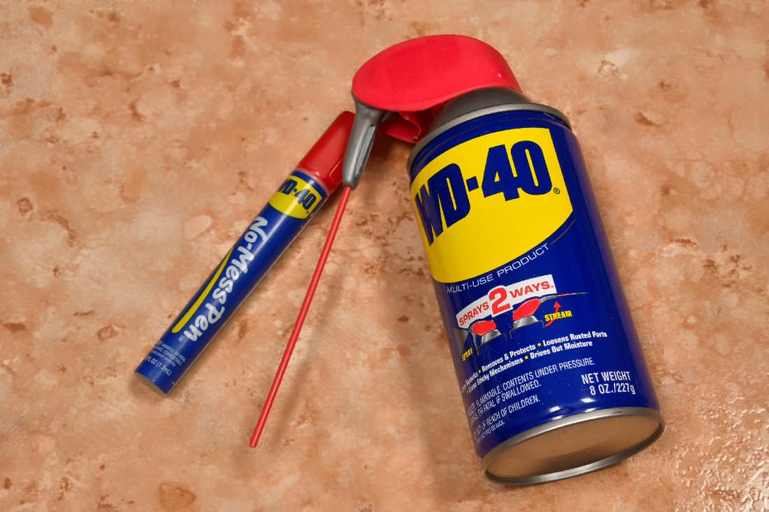Can of spray on WD-40 with a no mess pen