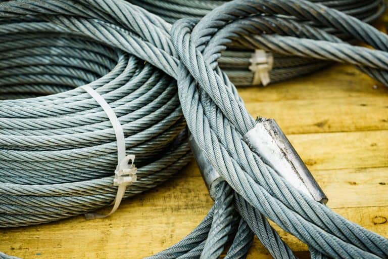 Clean new steel rope wire, coiled steel cable. Industrial equipment - How To Cut Wire Rope Or Cable Without Fraying