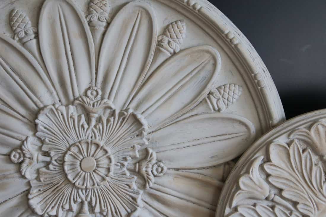 Close Up of Round Circular Decorative Ceiling Medallions Architectural Elements, Against Black Background (HDR Image)