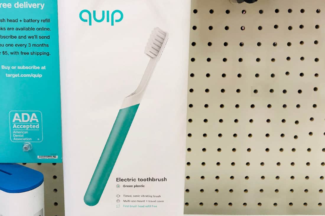 Close up of a Quip electric toothbrush