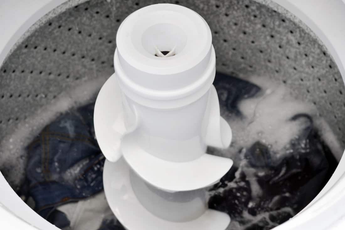Closeup of a washing machine in a wash cycle.