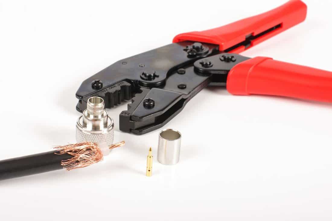 Coaxial cable termination tools and accessories isolated on the white background