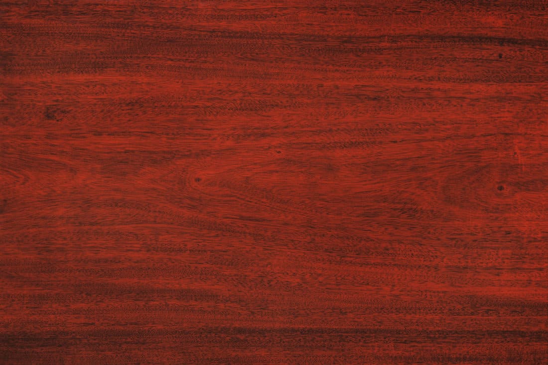 Dark textures of Cherry flooring photographed in top view