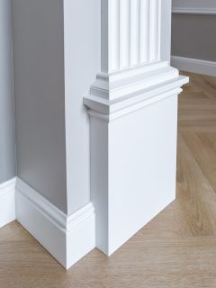 Detail of corner flooring with intricate crown molding - What Sherwin Williams Paint Is Best For Trim