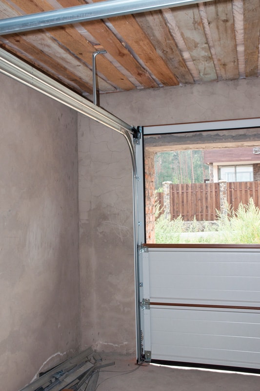 Garage Door Post Rail and Spring Installation