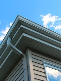 Gutter on house exterior. - Should Gutters Match Fascia, Roof Or House?