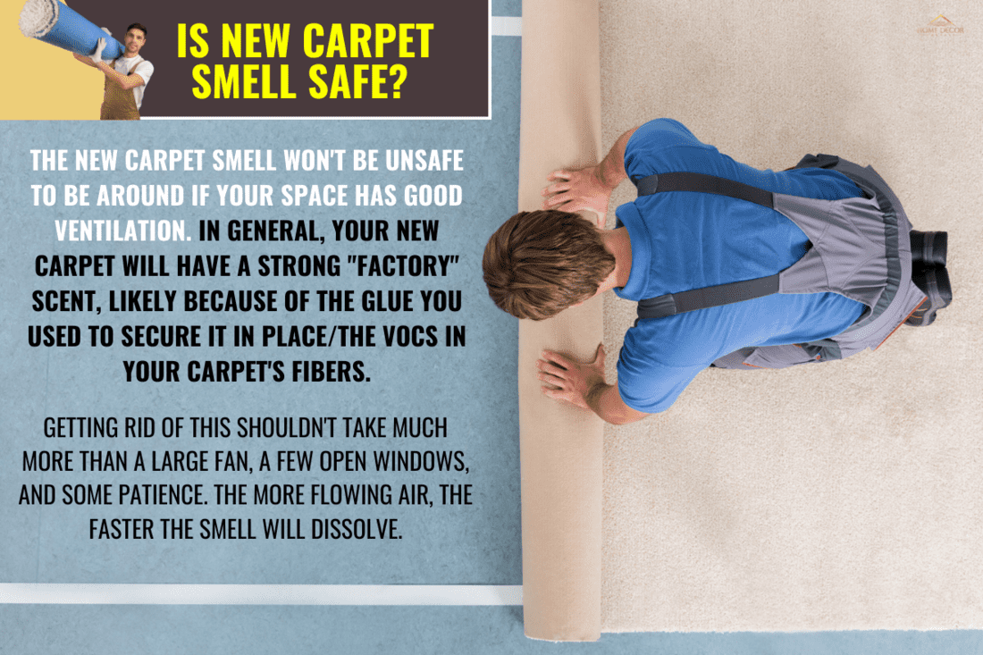 High Angle View Of Craftsman In Overalls Unrolling Carpet On Floor. - Is New Carpet Smell Safe How To Get Rid Of It From Your Home