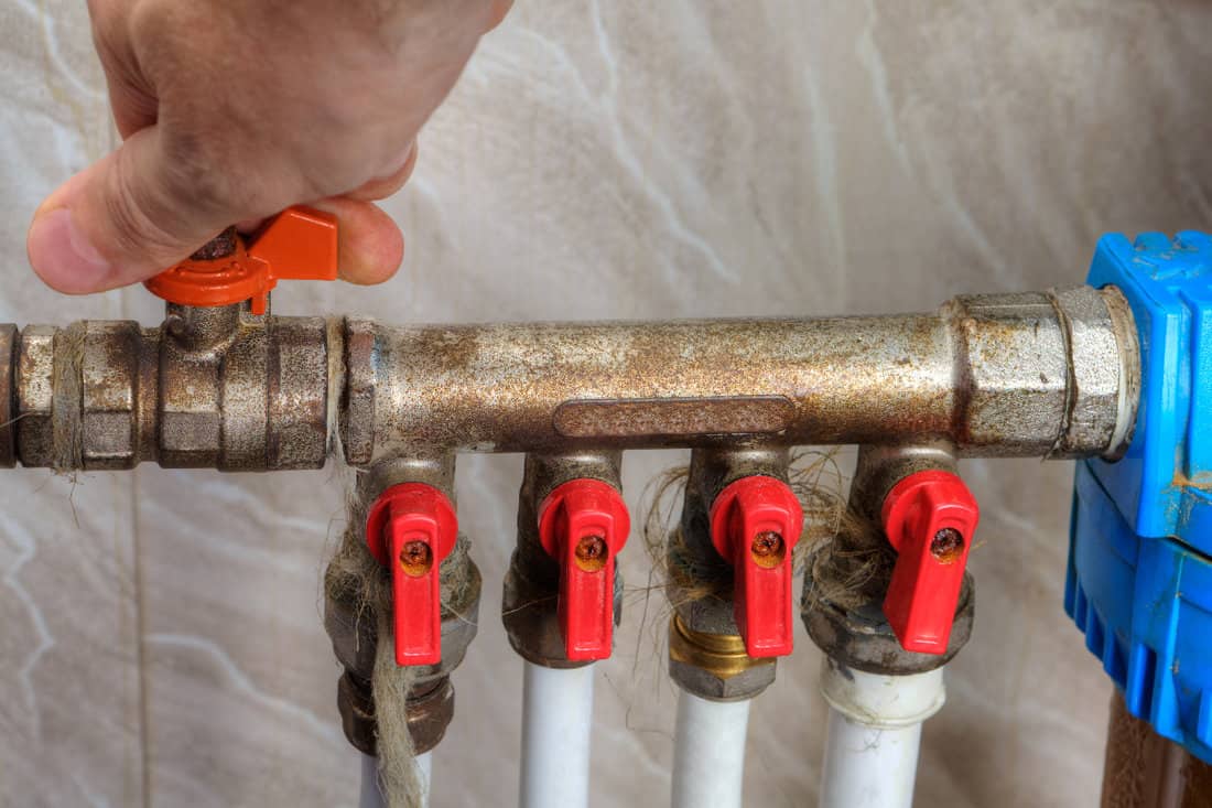 Human hand turn off shut-off valve home water supply