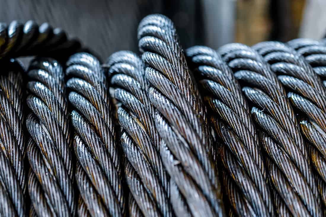 Industrial background with a coiled steel cable.