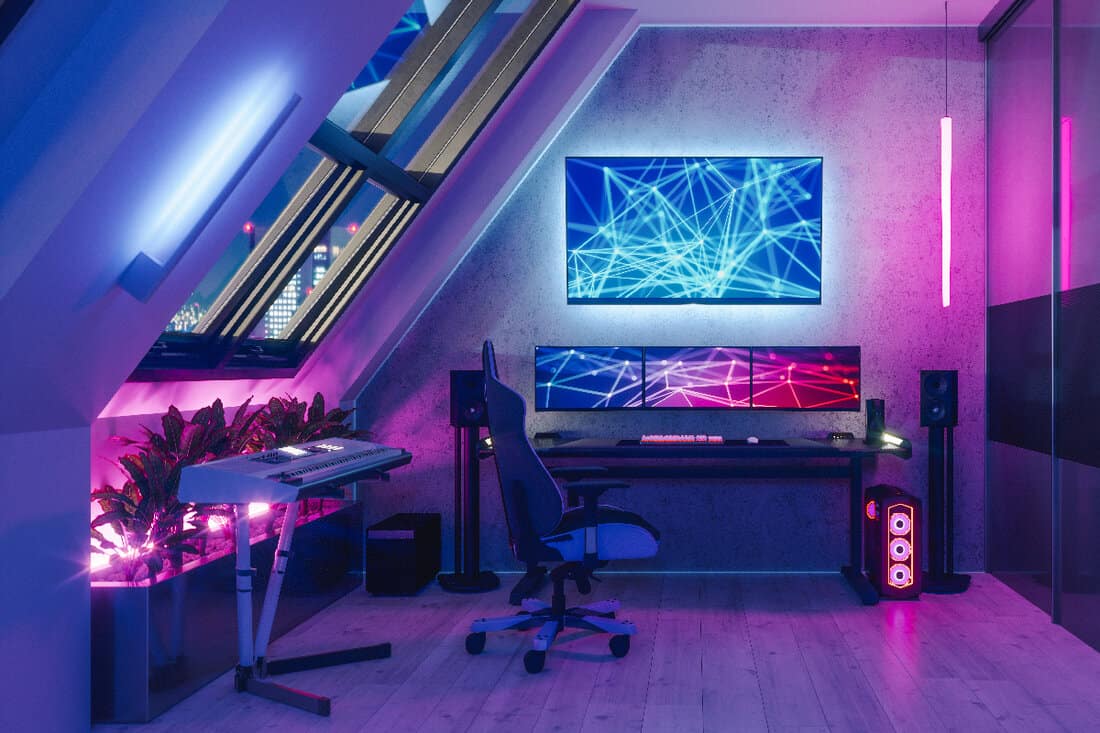 Interior of a gamer room lit with neon lights