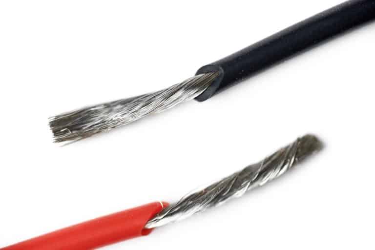 Isolated aluminum bare wires of electric cable. Red and black wires without insulation for speakers or power. Supply of electricity to device, Can I Connect Red And Black Wires Together? [Safely]