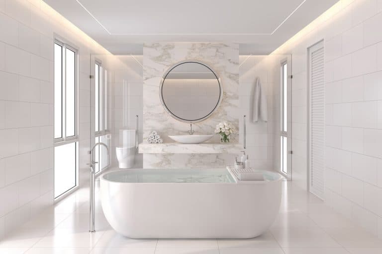 Luxurious white bathroom modern style render. The room has white tiles and the wall is decorated with marble at the back of the basin wall. There is a large window of natural light into the room. - Roman Bath Tubs: Sizes, Faucets, & Design Ideas