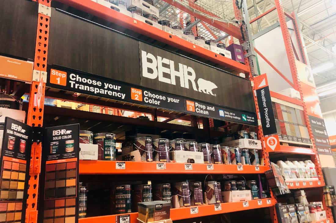 Large behr paint display inside of a home depot home improvement store
