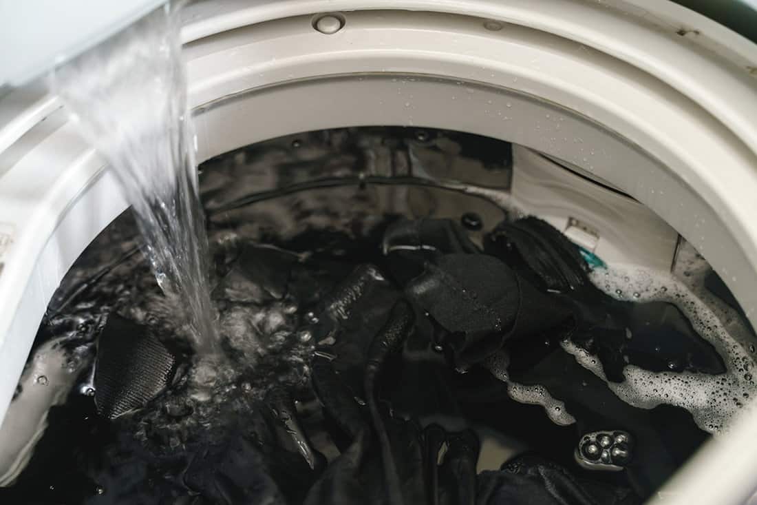 Laundry clothes in top loading washing machine