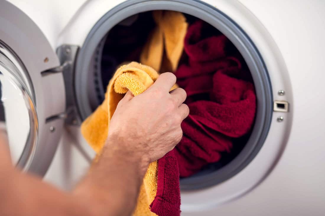 Loading clothes in washing machine