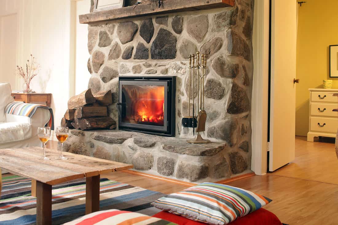 Log cabin fireplace close-up