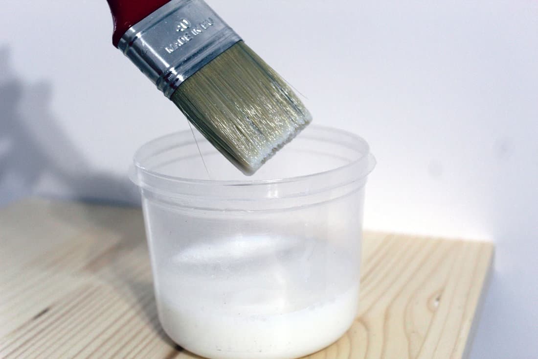 Paint brush with water based colorless lacquer