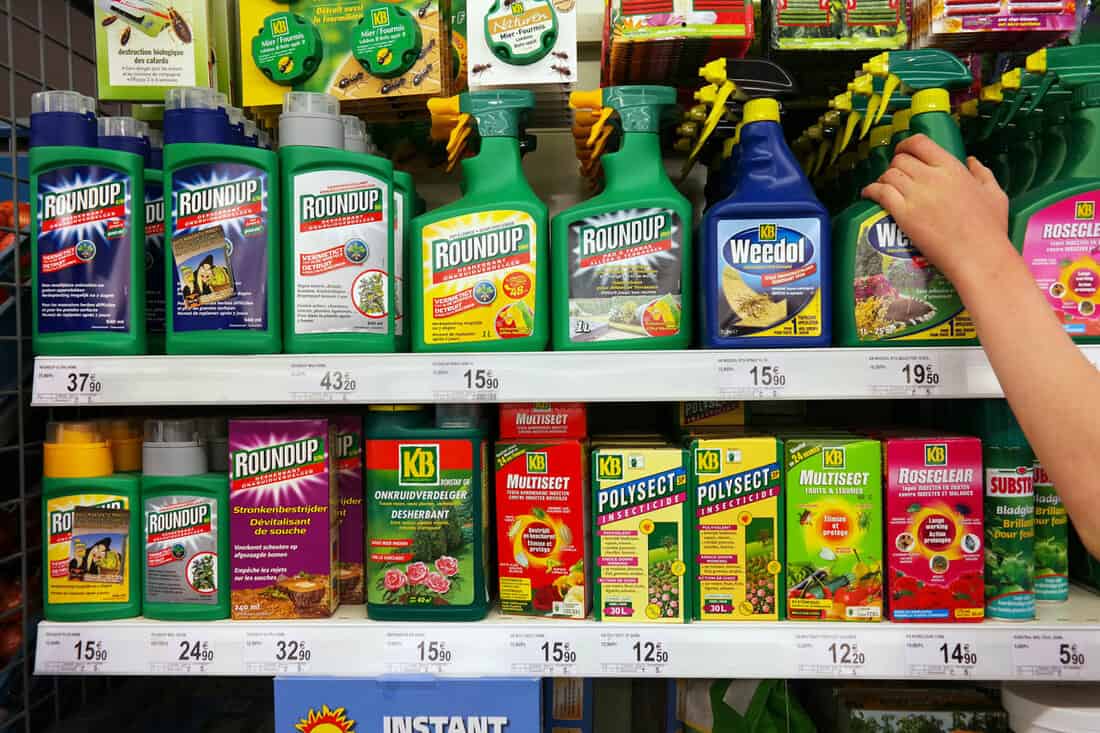 Shelves with a variety of Pesticides in a Carrefour Supermarket