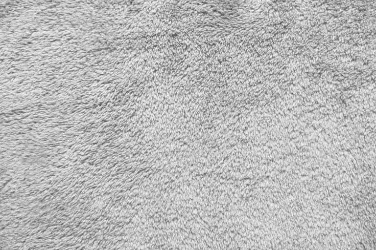 Texture of gray carpet background - What Are The High-End Carpet Brands [Considerations For Homeowners]