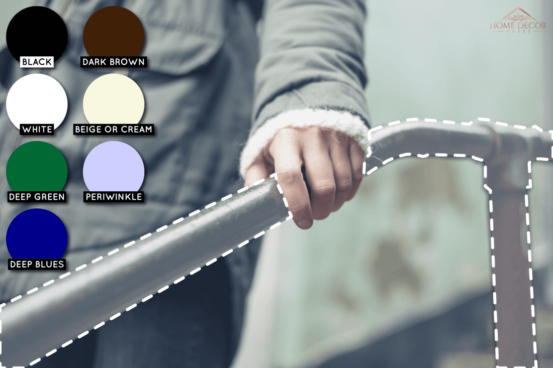 hand-woman-holding-on-metal-banister, What Kind Of Paint & Finish To Use On Handrails? [Inc. Tips & Tricks]