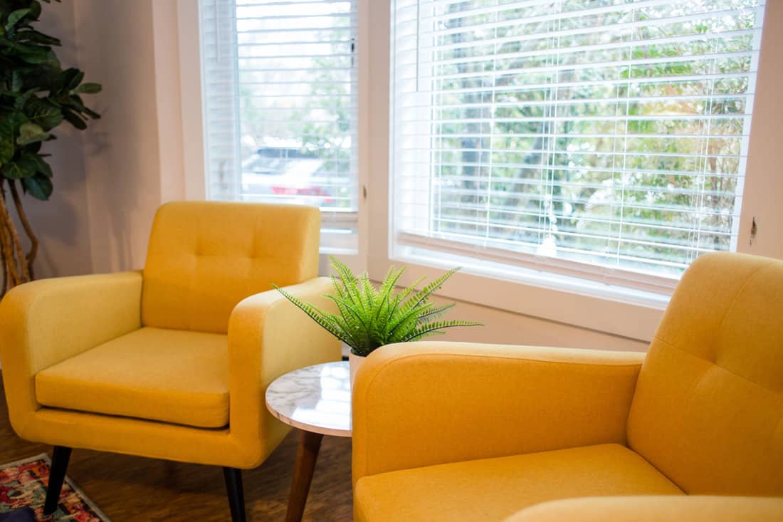 Yellow couches inside a therapist office