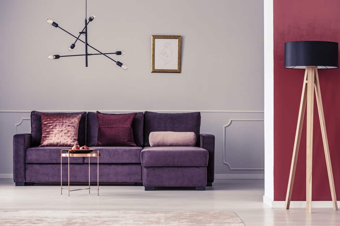 purple-corner-sofa-modern-chandelier-copper