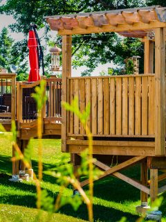 raised-backyard-wooden-deck-gazebo-treed, Can I Put A Pergola On A Raised Deck?