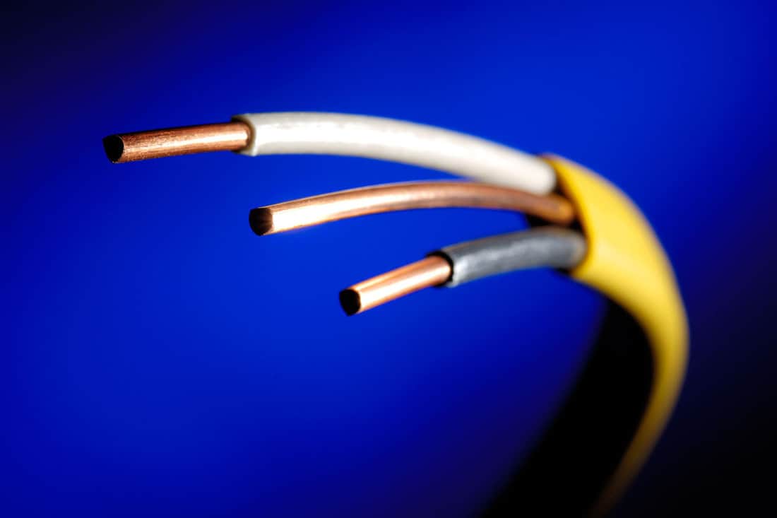 romex wires on a blue background