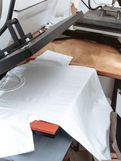 unrecognizable-person-working-on-iron-sublimation, Can You Use An Iron Instead Of A Heat Press?