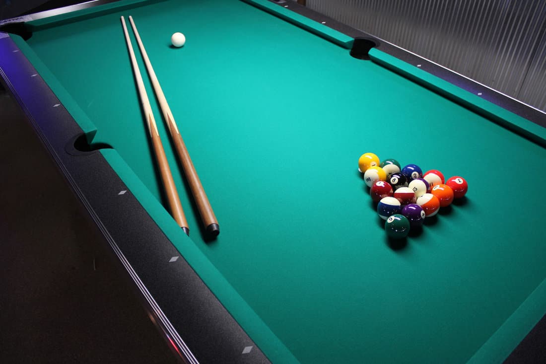 A pool Table, set up for a game