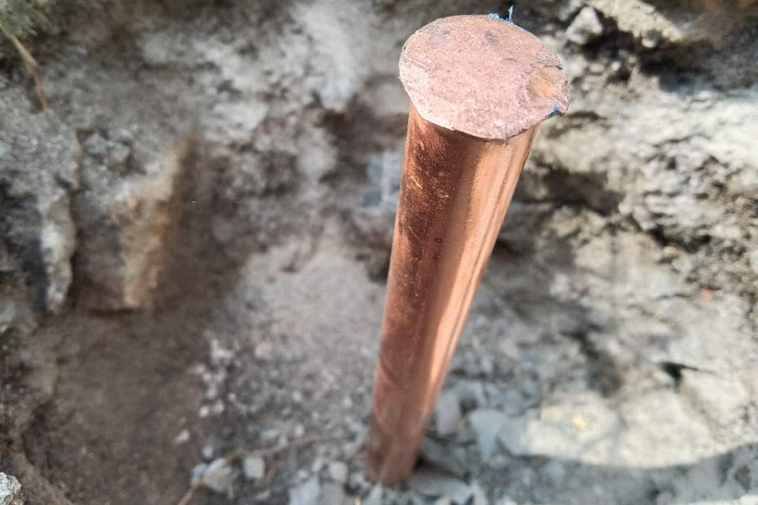 Copper ground wire on ground rod