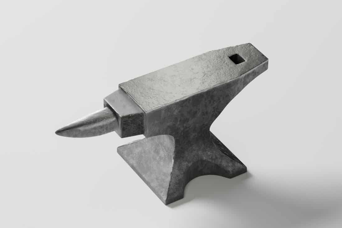 Metal anvil with black background, 3d rendering. Computer digital drawing. 