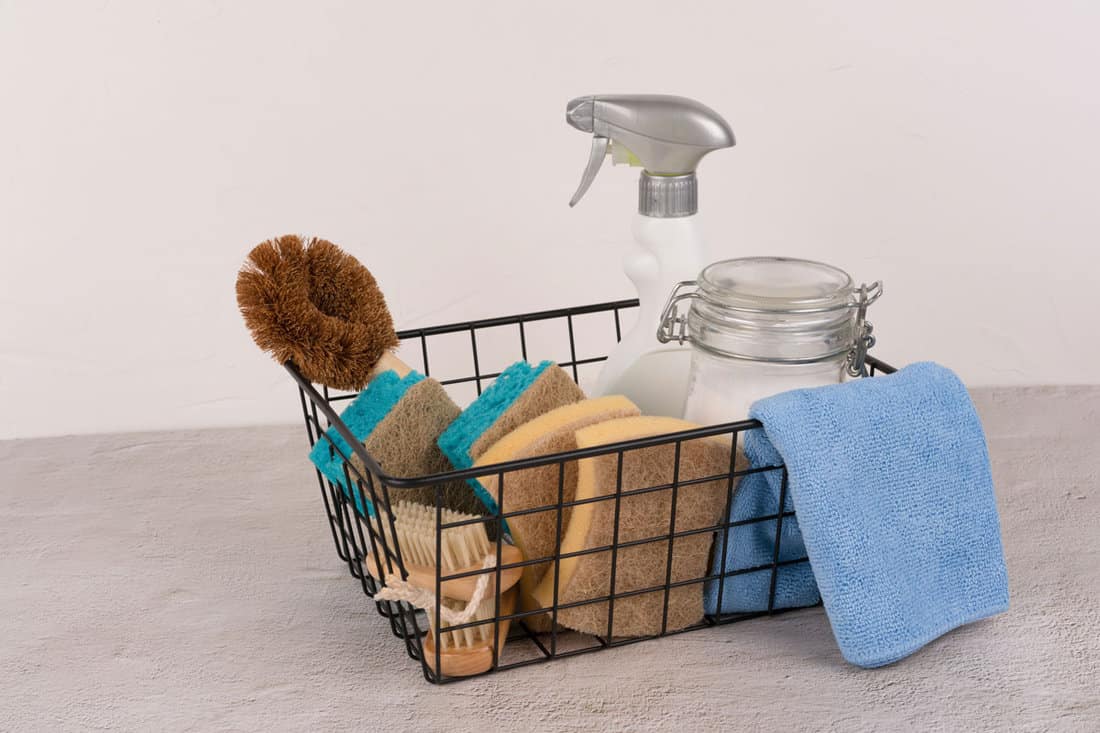 Metal basket with bio organic detergent products, green household products and washing concept