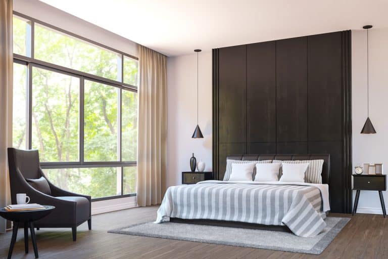 Modern bedroom decorate with brown leather furniture and black wood 3d, Do You Need A Rug Pad Under A Bed?