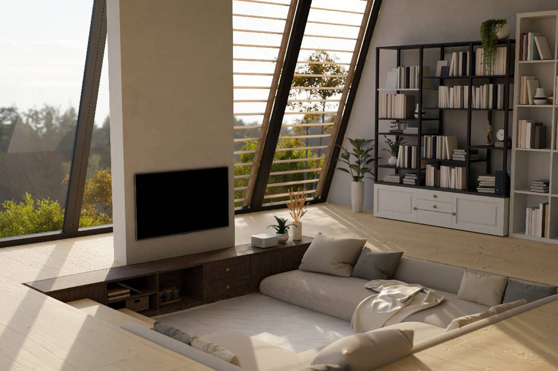 Modern contemporary sunken living room interior design with comfortable sofa