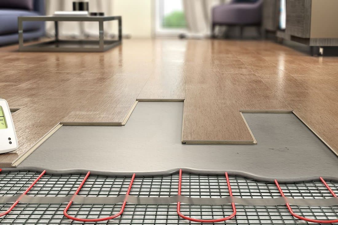 Process of laying laminate panels on floor with underfloor heating, 3d illustration