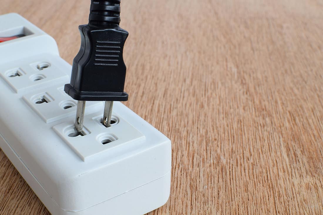 Remove power plugs on electrical socket