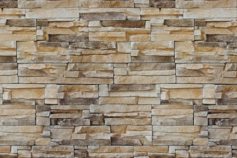 Stone wall backdrop. Facing Stone. Seamless texture background Sandstone - What Color Stone Goes With White Siding