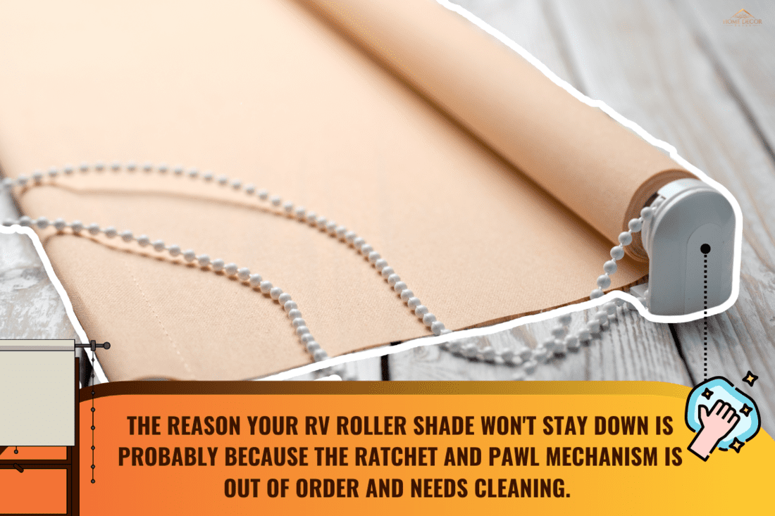 The rolled beige shutters is on a wooden surface. Beige blinds lie on an old wooden white table. - RV Roller Shade Won't Stay Down - Why What To Do