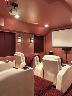 Theater room in upscale home, What Is The Best Wattage For A Home Theater?