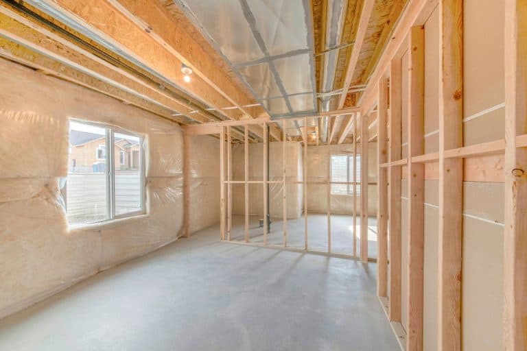 Unfinished basement with wood framing and insulated walls, Do You Need A Vapor Barrier Behind Cement Board?