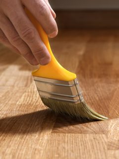Varnishing lacquering parquet floor by paintbrush, How To Tone Down Yellow Wood Floors